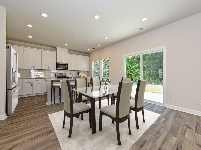 The main-level is perfect for hosting elegant dinner parties or relaxing with family.