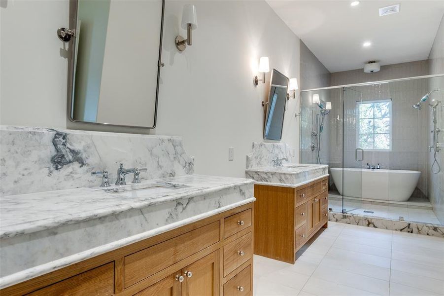 Bathroom featuring vanity, separate shower and tub, tile patterned floors, and decorative backsplash