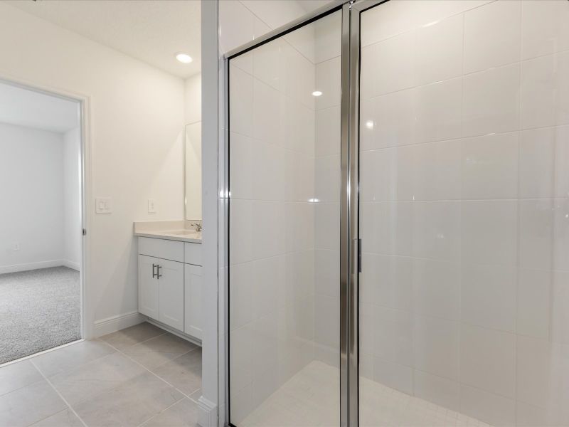 Primary bathroom in the Everglade floorplan at 209 Links Terrace Blvd