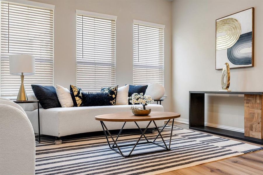 Living room with dark hardwood / wood-style flooring