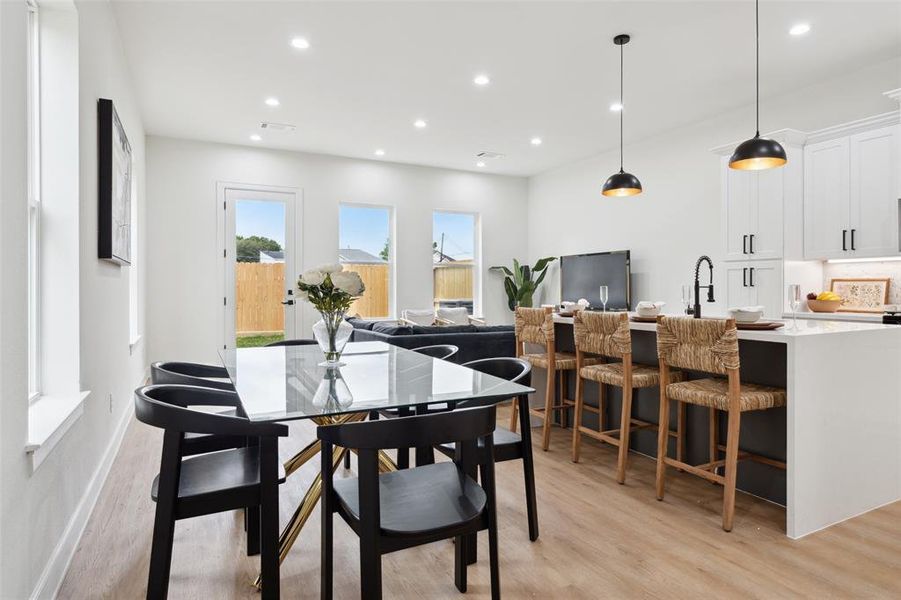 Bask in the natural light flooding the dining area, setting an inviting ambiance for gatherings of 6-8 guests. With ample seating, whether it's a casual brunch or a formal dinner, everyone will feel at home in this sun-kissed space.