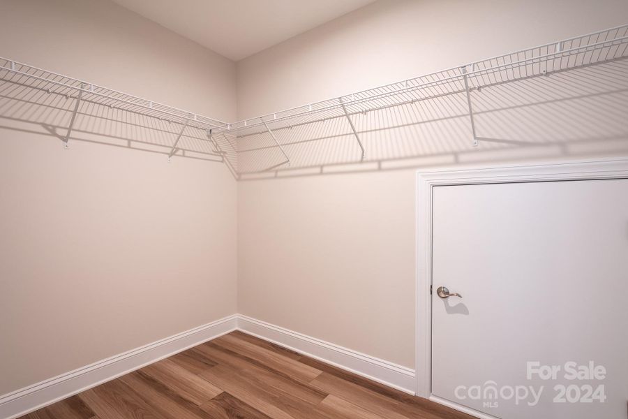 Large closet in upstairs Loft/Bonus is the perfect space for those extra storage needs that you have when downsizing.