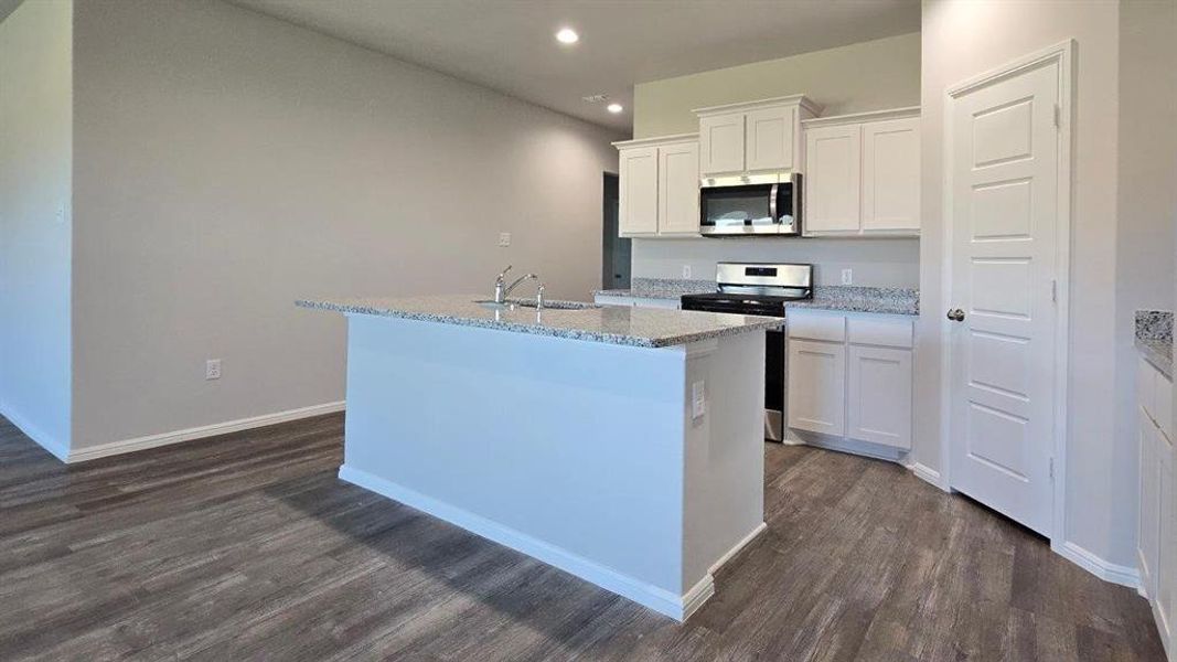 Kitchen - All Home and community information, including pricing, included features, terms, availability and amenities, are subject to change at any time without notice or obligation. All Drawings, pictures, photographs, video, square footages, floor plans, elevations, features, colors and sizes are approximate for illustration purposes only and will vary from the homes as built.