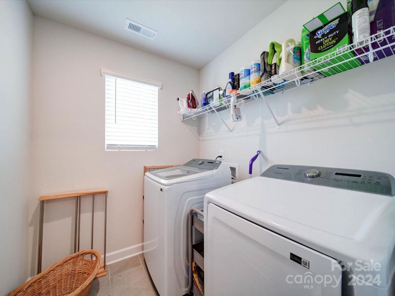 UPPER LEVEL LAUNDRY CLOSET.