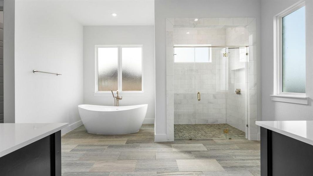 Bathroom with vanity and a healthy amount of sunlight