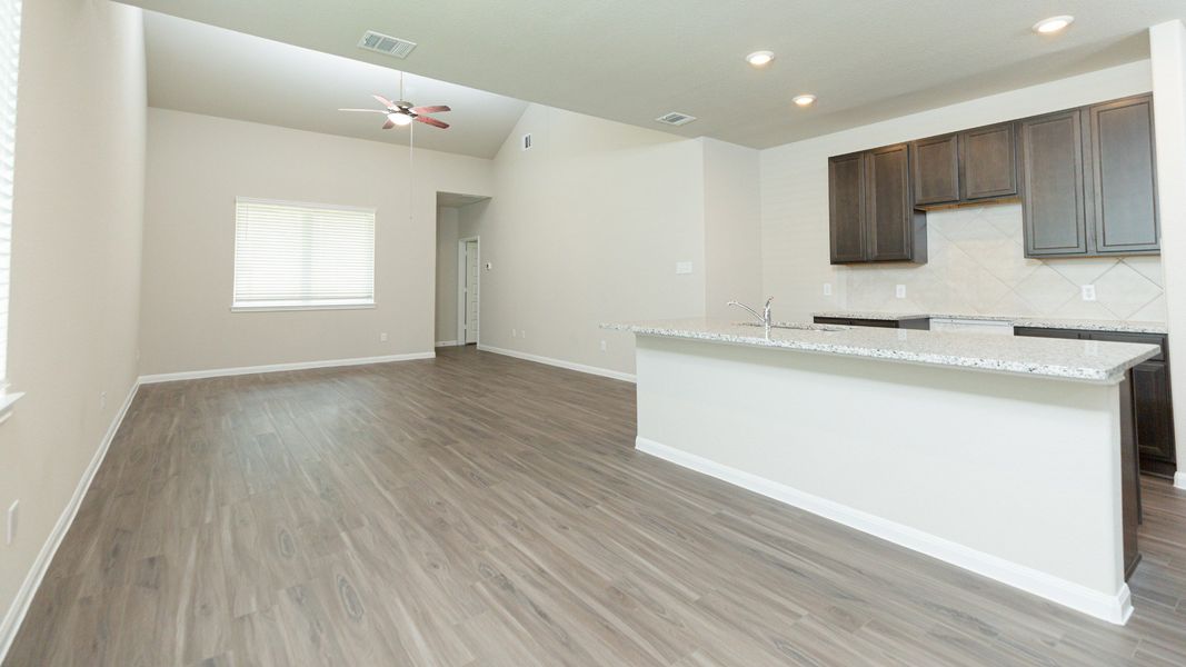 Dining Area to Kitchen and Family Room