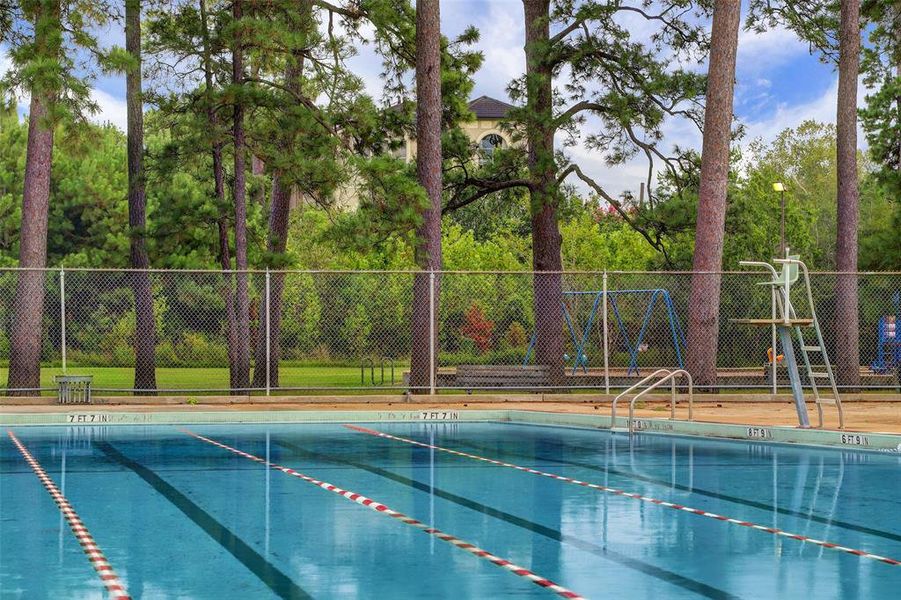 The public neighborhood swimming pool is the perfect place to cool off on those hot Houston summer afternoons.