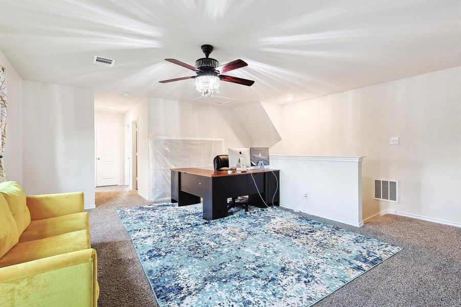 Office featuring ceiling fan and carpet flooring