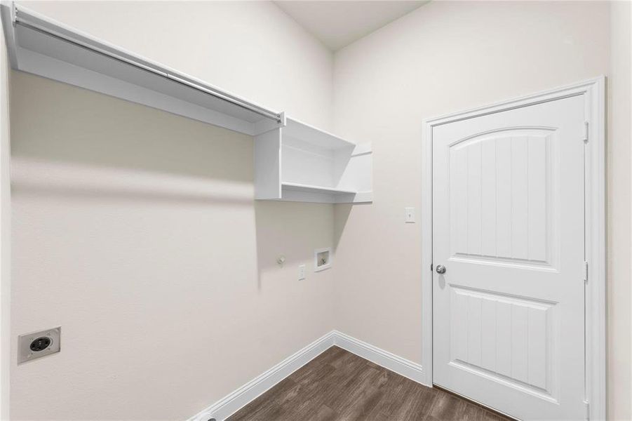 Washroom featuring washer hookup, dark hardwood / wood-style floors, gas dryer hookup, and electric dryer hookup