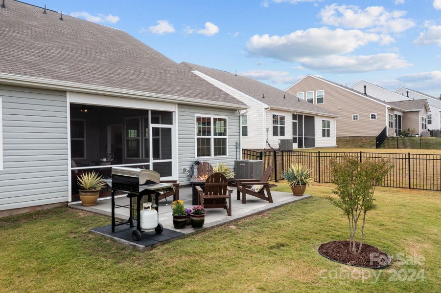 Patio space in the fenced backyard adds a wonderful dimension to life! Sit outside and absorb nature, entertain or be in solitude.  Make your backyard your oasis!