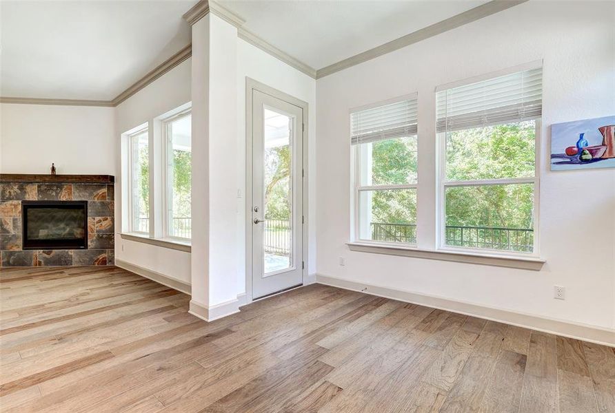 Door to backyard, dining and fireplace view