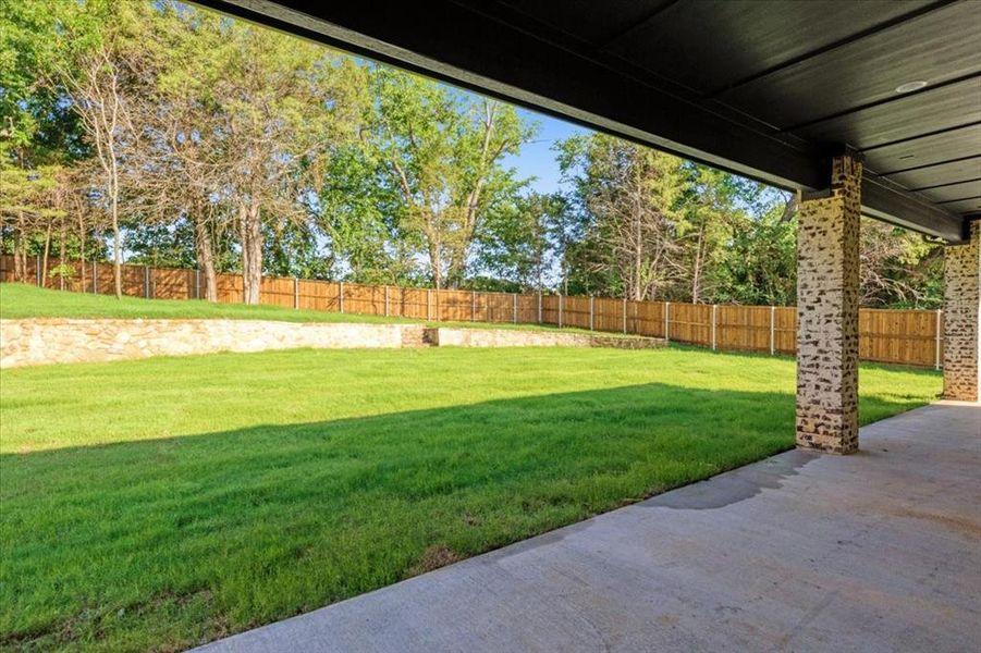 View of yard with a patio