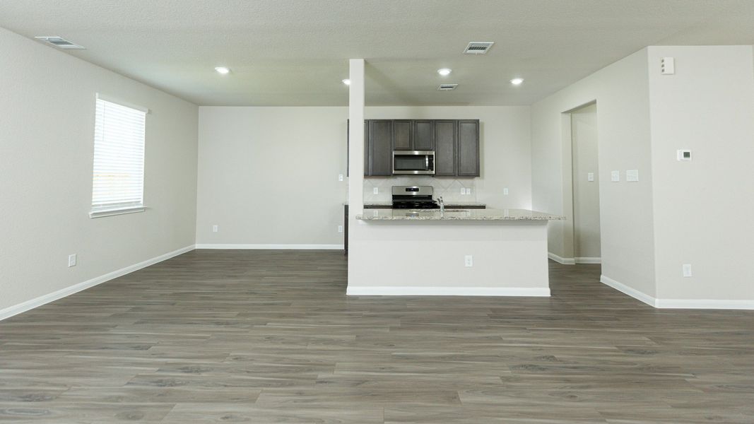 Family Room to Kitchen and Dining Area