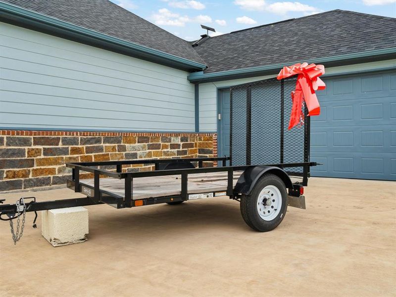 Carry On Trailer 5X8 Foot Open Wood Floor Utility Trailer, 1450 lb Capacity is also being gifted to the buyers upon closing.