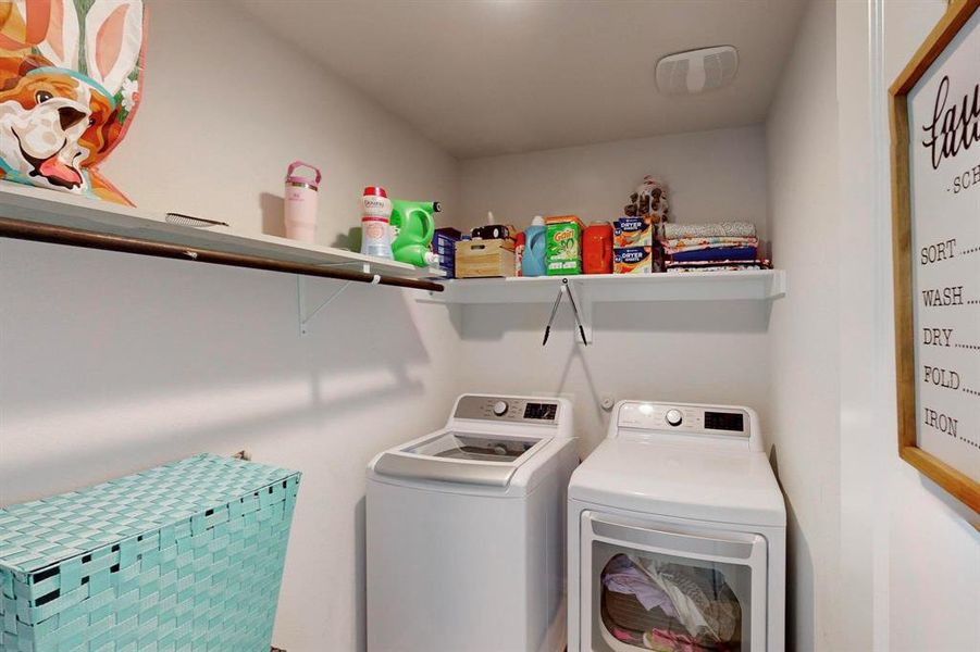 Clothes washing area with washing machine and dryer