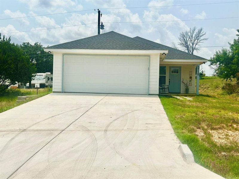 Ranch-style home with a garage