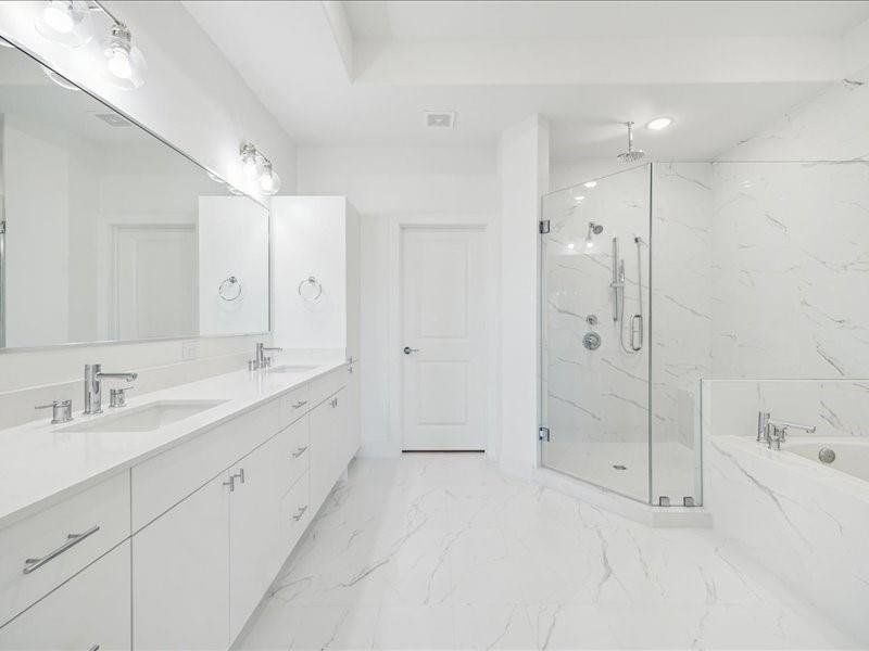 Expansive primary suite bathroom