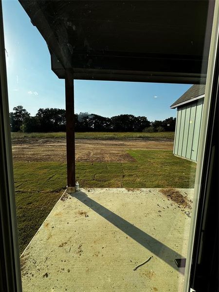 View of yard featuring a patio and a rural view