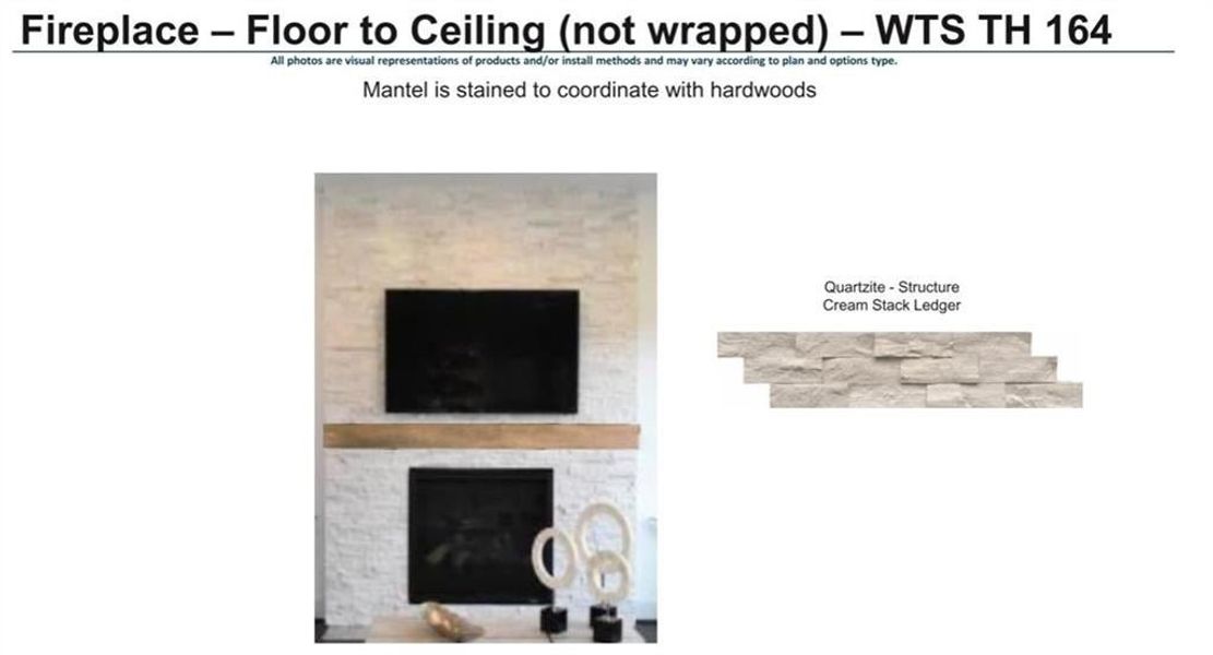 Fireplace includes stacked quartzite from floor to ceiling