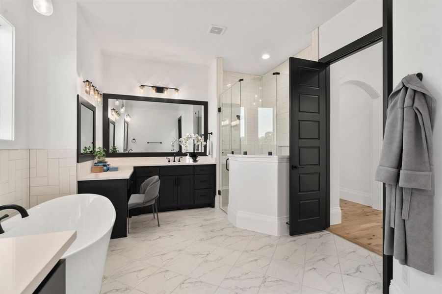 Another view of this luxury space with a huge walk-in shower. *Virtually staged.