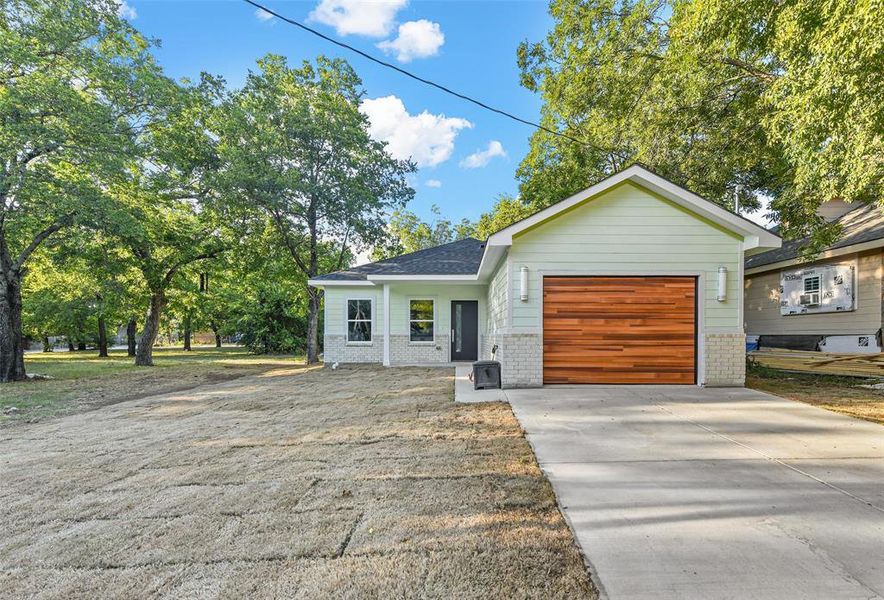 View of front of home with a garage