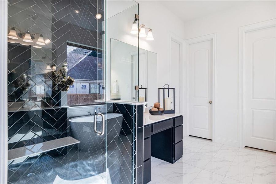 Master bath featuring separate walk in shower and vanity