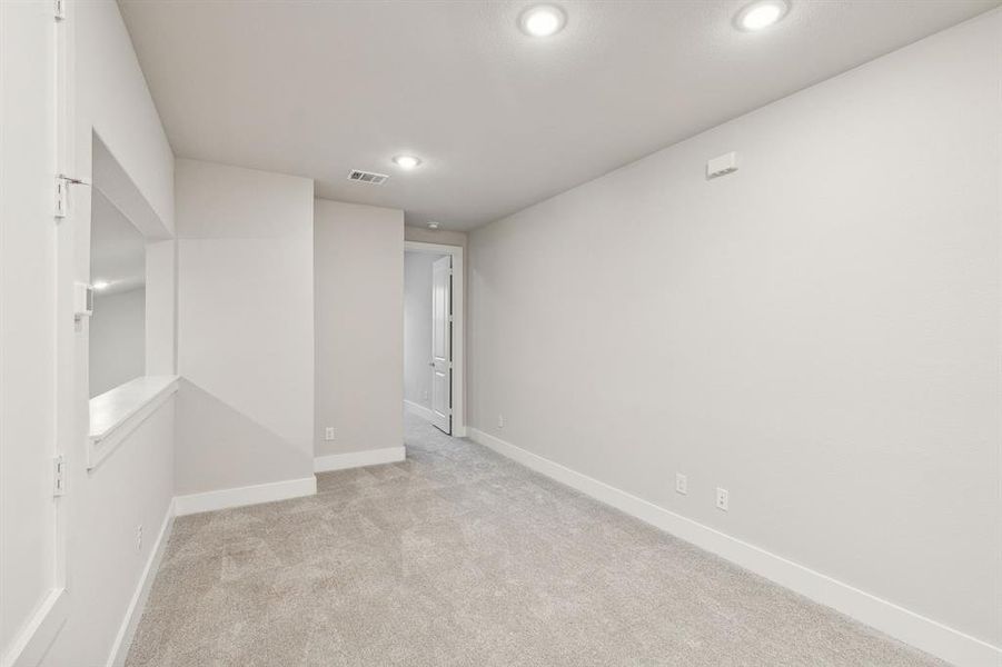 Spare room with light carpet