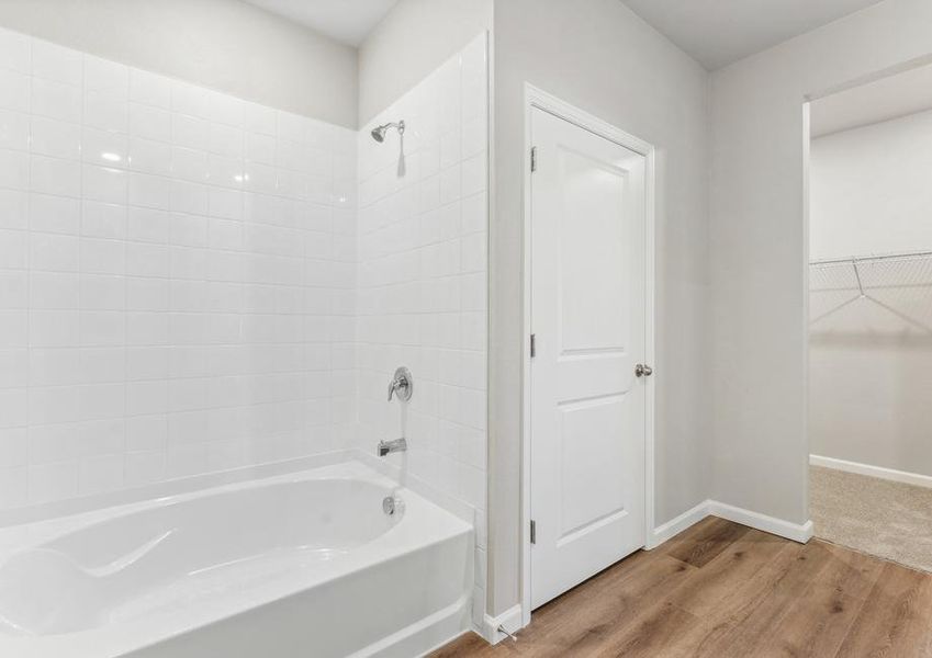 The master bathroom has a tub shower combo.