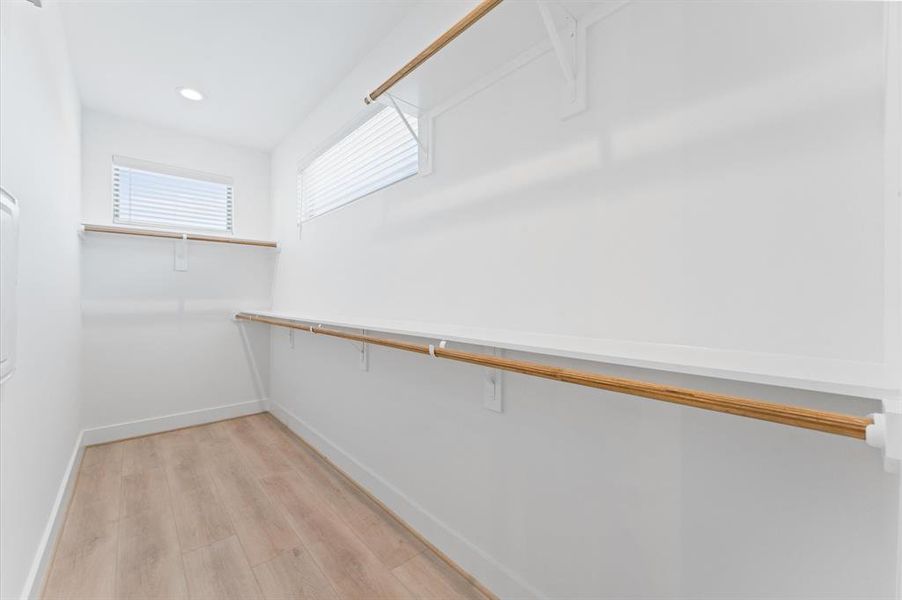 Spacious primary walk in closet (Photos are of the  model home floor plan A)