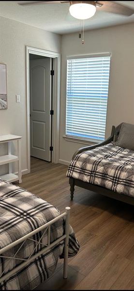 Bedroom featuring hardwood / wood-style flooring