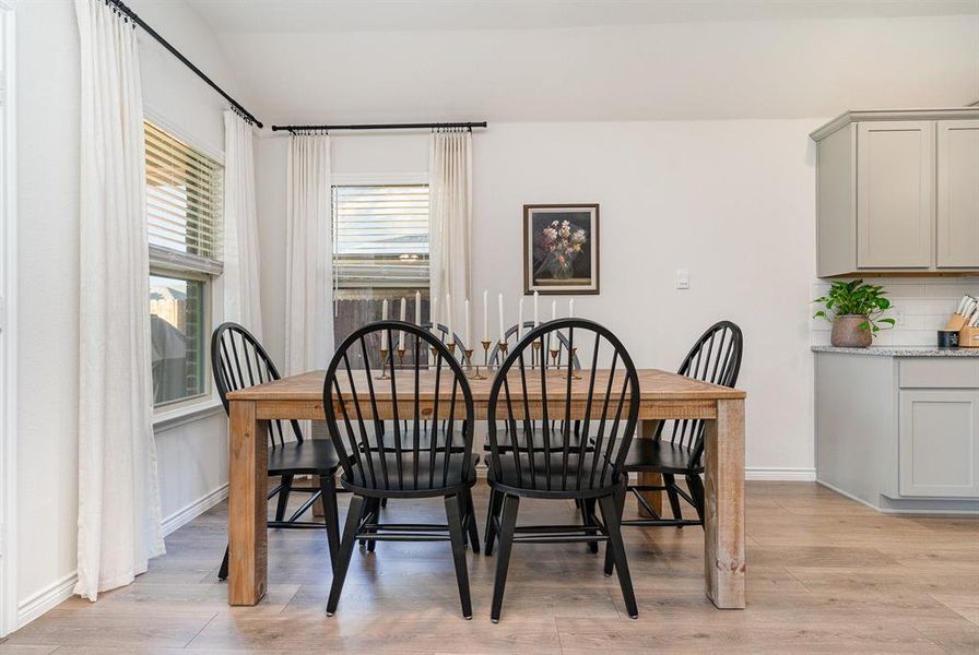 Dining space featuring light hardwood / wood-style flooring