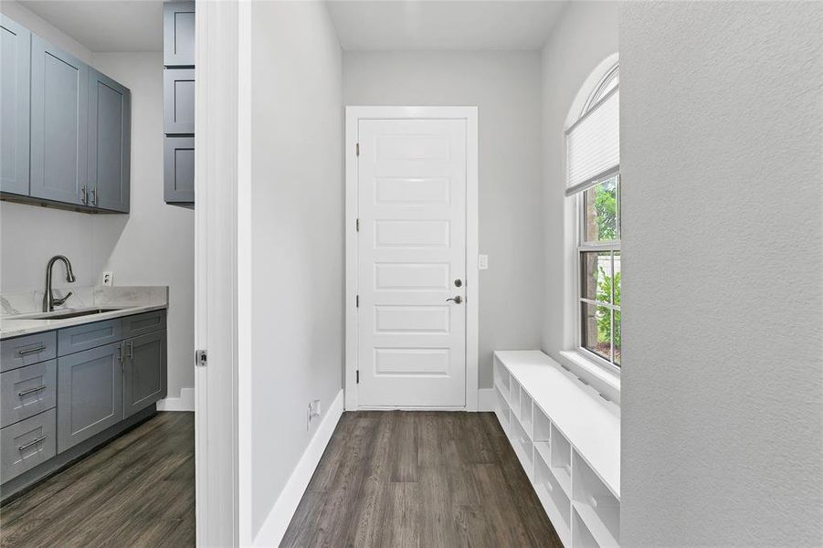 Laundry room, mudroom and door to garage