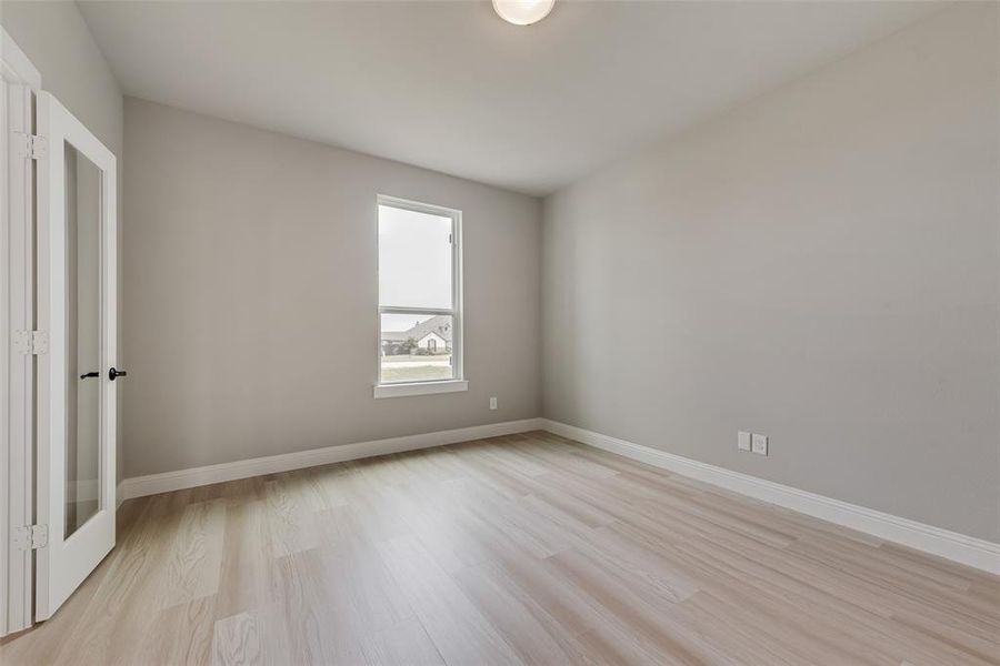 Unfurnished room featuring light hardwood / wood-style flooring