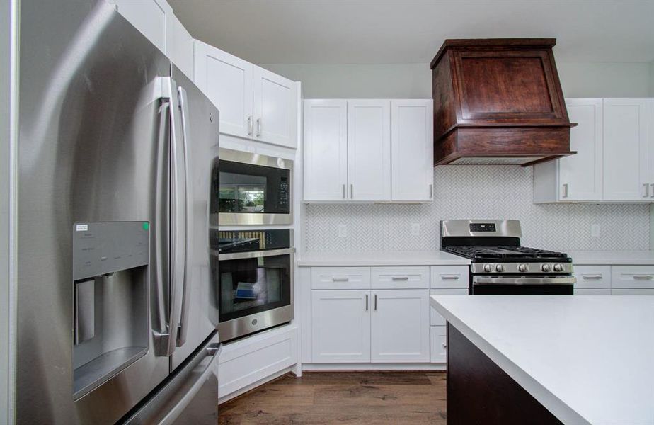 This chefs kitchen comes fully equipped with luxurious stainless steel appliances