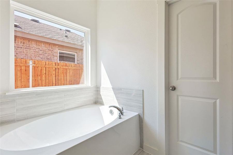 Bathroom featuring a bathing tub