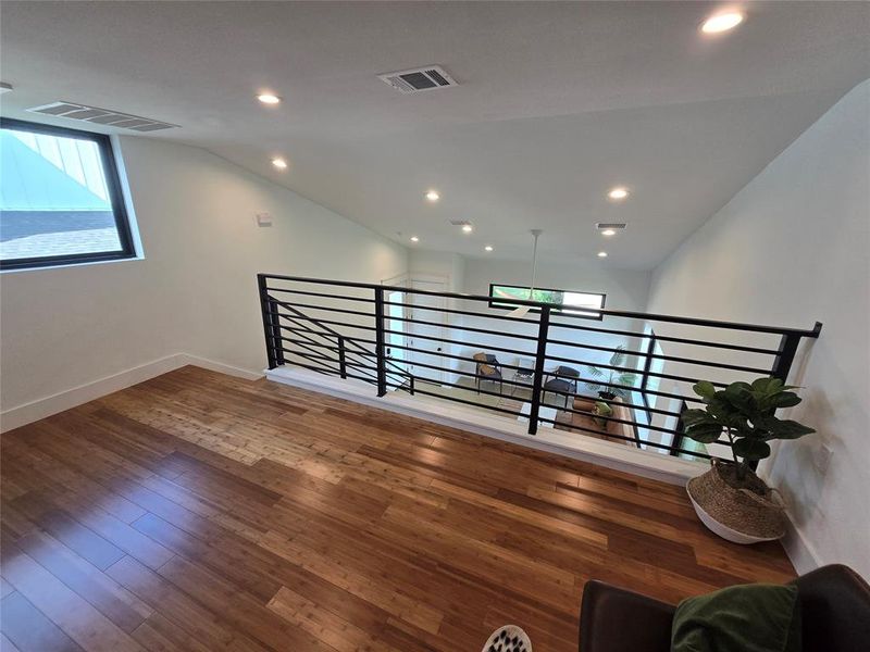 Another large window on the left in the loft for natural light.