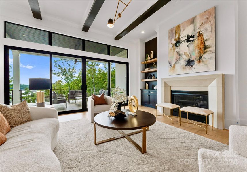 Living room with fireplace and sliding doors to incorporate outdoor entertaining