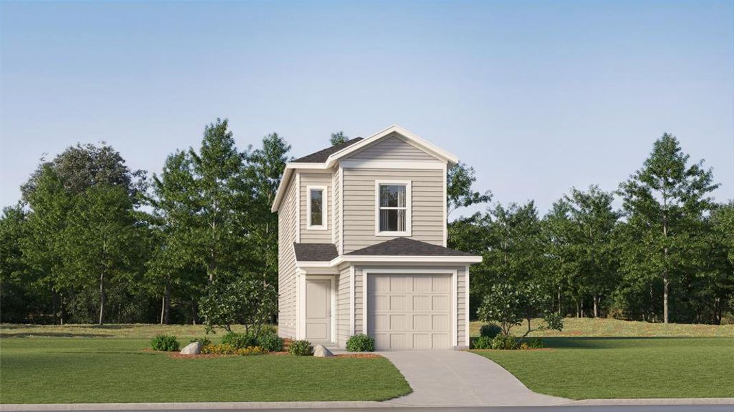 View of front of property with a garage and a front yard