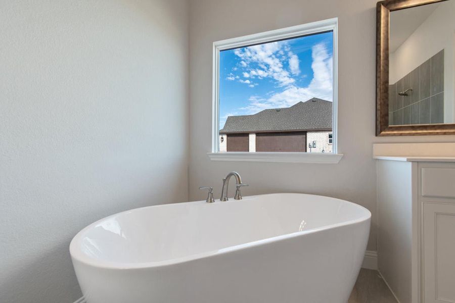 Primary Bathroom | Concept 2406 at Hidden Creek Estates in Van Alstyne, TX by Landsea Homes