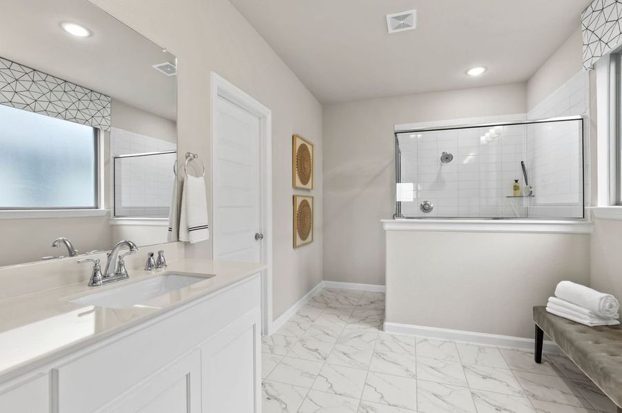 Primary Bathroom in the Wimbledon | Dove Hollow home plan by Trophy Signature Homes – REPRESENTATIVE PHOTO