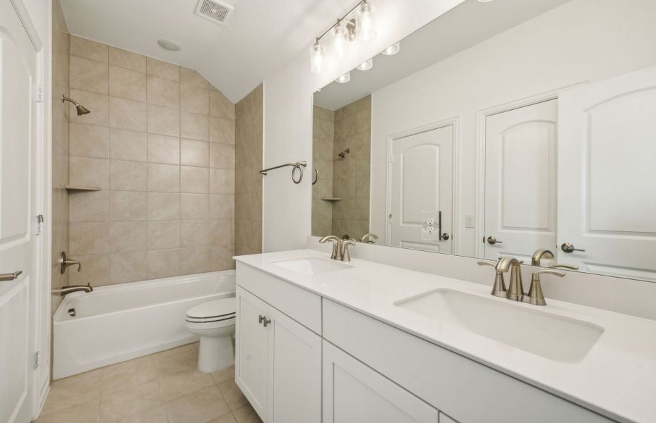 Spacious secondary bathroom with large shower