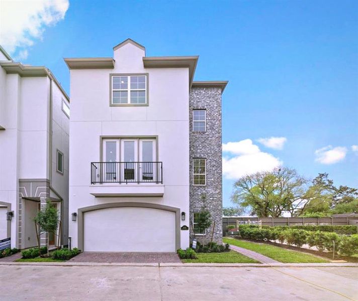 The Claudia Floor plan has a beautiful brick detail and this home is situated on a corner lot which adds extra light and privacy.