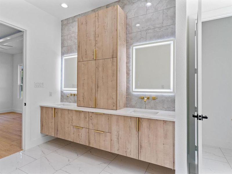 Bathroom with vanity and hardwood / wood-style floors