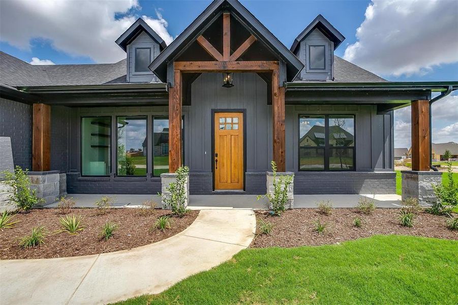 View of front of property with a porch