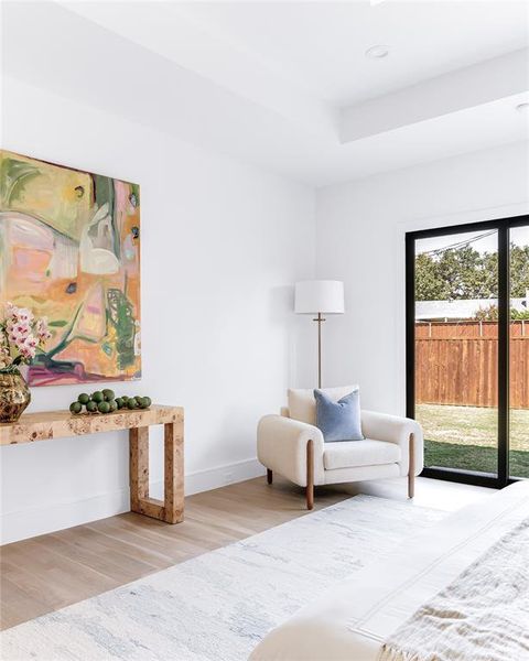 Living area with light hardwood / wood-style floors