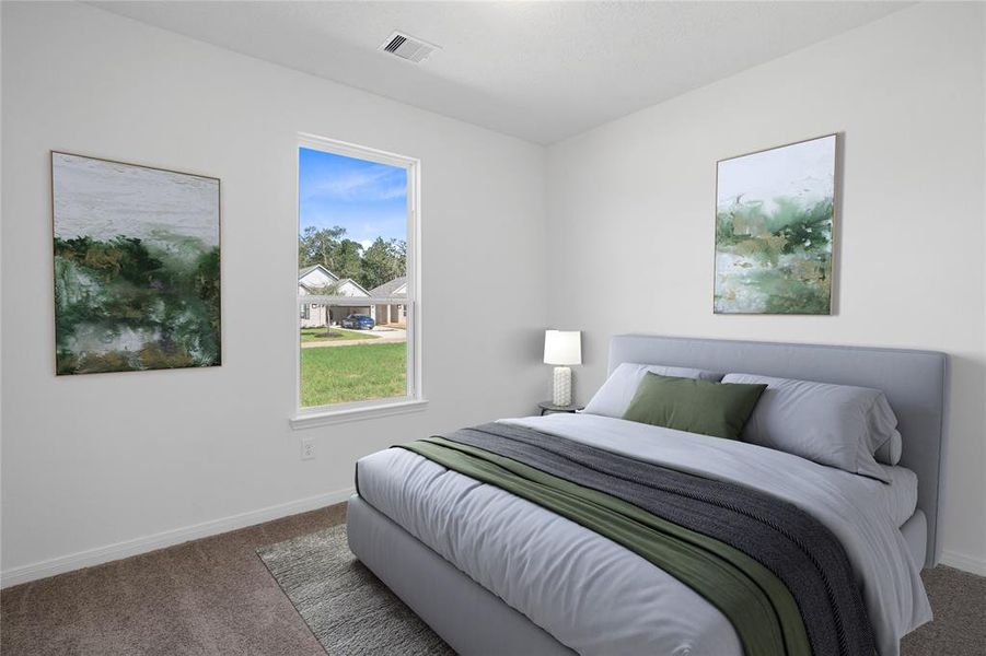 Secondary bedroom features plush carpet, neutral paint, lighting, large window with privacy blinds and ample sized closet space.