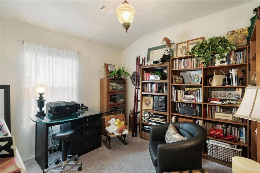 Bedroom #3, could be your office or library. Fixture in this room has been removed from home and replaced with the builders supplied fixture.