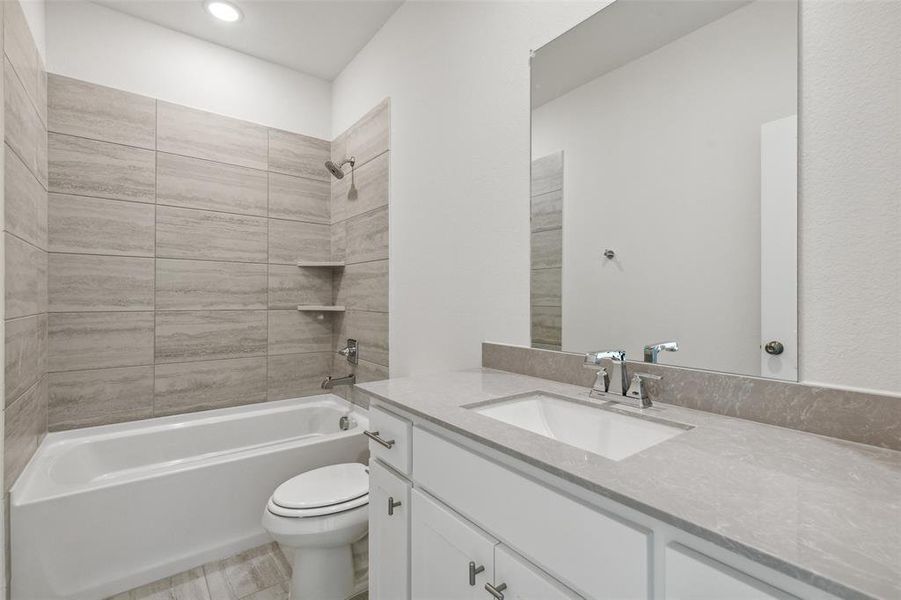 Friends and family will feel right at home in any of the beautifully finished guest baths.