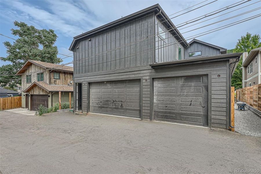 New finished, heated three car garage with 1 bed, 1 bath ADU above.