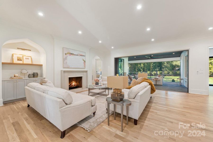 Accordian doors opening up to the screen porch allows for great indoor/outdoor living.